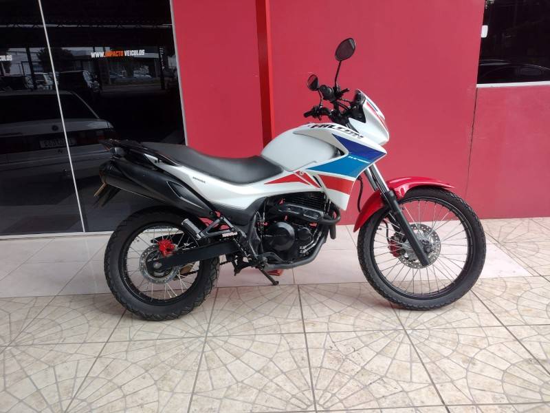 HONDA - NX 400I FALCON - 2015/2015 - Vermelha - R$ 21.900,00